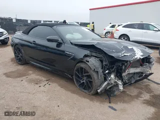 2014 BMW M6 with VIN WBSLZ9C58ED651156, listed as a IAAI auction lot 41526192 with 90,642 mi miles. Bid and sale history available at carsss.com. Image 1.
