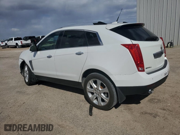 2014 Cadillac SRX Premium Collection z VIN 3GYFNGE32ES573872, wystawiony jako Copart lot #49871955 z przebiegiem 119 362 mil mil oraz Szkody całkowita. Historia ofert i sprzedaży dostępna na DreamBid. Obrazek 2.
