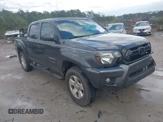 2010 Toyota Tacoma PreRunner with VIN 3TMJU4GN5AM106928, listed as a IAAI auction lot 41730400 with 156,374 mi miles and . Bid and sale history available at DreamBid. Image 1.