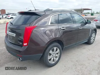 2015 Cadillac SRX Luxury Collection z VIN 3GYFNBE35FS597538, wystawiony jako IAAI lot #42056002 z przebiegiem 49 483 mil mil oraz . Historia ofert i sprzedaży dostępna na DreamBid. Obrazek 4.