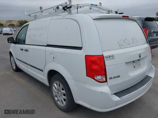 2014 Ram Cargo Van Tradesman with VIN 2C4JRGAG9ER406306, listed as a IAAI auction lot 41928370 with 174,352 mi miles. Bid and sale history available at carsss.com. Image 3.
