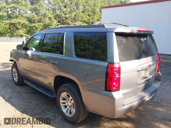2018 Chevrolet Tahoe LT with VIN 1GNSKBKC7JR393246, listed as a IAAI auction lot 42544844 with 87,994 mi miles and . Bid and sale history available at DreamBid. Image 3.