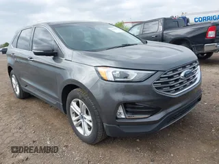 2019 Ford Edge SEL z VIN 2FMPK4J92KBC60085, wystawiony jako IAAI lot #42139853 z przebiegiem 96 667 mil mil oraz . Historia ofert i sprzedaży dostępna na DreamBid. Obrazek 1.