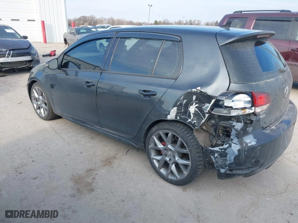 2013 Volkswagen GTI with VIN WVWHV7AJ2DW129476, listed as a IAAI auction lot 41716090 with 132,996 mi miles. Bid and sale history available at carsss.com. Image 3.