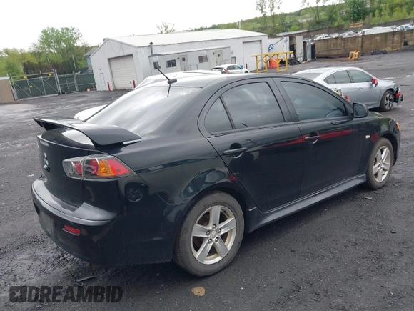 2014 Mitsubishi Lancer SE with VIN JA32V2FW5EU005615, listed as a IAAI auction lot 42204917 with 141,285 mi miles and . Bid and sale history available at carsss.com. Image 4.
