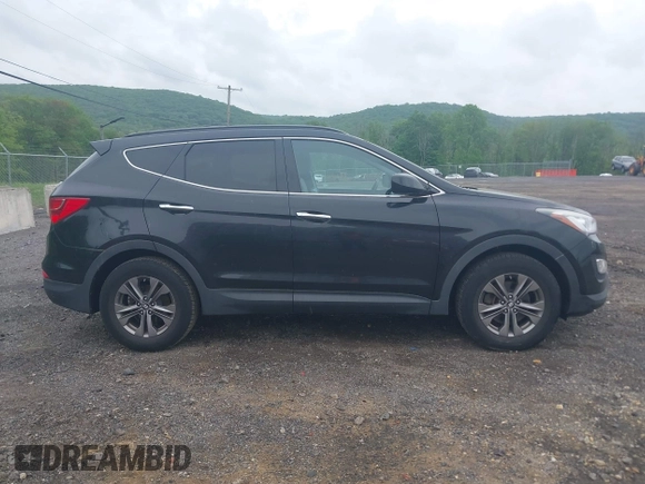 2014 Hyundai Santa Fe z VIN 5XYZUDLB9EG224174, wystawiony jako IAAI lot #42244140 z przebiegiem 84 341 mil mil oraz . Historia ofert i sprzedaży dostępna na DreamBid. Obrazek 13.