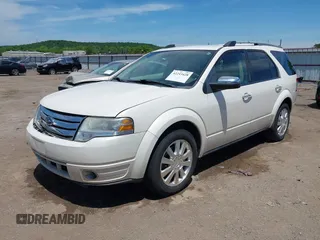 2009 Ford Taurus X Limited z VIN 1FMDK03W99GA03698, wystawiony jako IAAI lot #42243428 z przebiegiem 158 551 mil mil oraz . Historia ofert i sprzedaży dostępna na DreamBid. Obrazek 17.