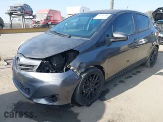 2012 Toyota Yaris L with VIN JTDKTUD31CD510740, listed as a IAAI auction lot 41214709 with 193,754 mi miles. Bid and sale history available at carsss.com. Image 18.