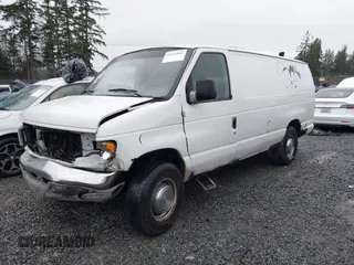 2004 Ford Econoline Cargo with VIN 1FTSS34L84HA56056, listed as a IAAI auction lot 41235862 with 215,095 mi miles and . Bid and sale history available at DreamBid. Image 17.