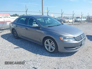 2014 Volkswagen Passat SE with VIN 1VWBT7A34EC030770, listed as a IAAI auction lot 42667010 with 248,038 mi miles and . Bid and sale history available at DreamBid. Image 1.