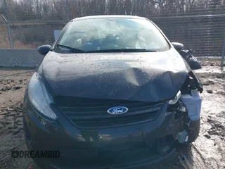 2013 Ford Fiesta S z VIN 3FADP4AJ2DM129703, wystawiony jako IAAI lot #41669041 z przebiegiem 138 831 mil mil oraz . Historia ofert i sprzedaży dostępna na DreamBid. Obrazek 12.