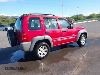 2004 Jeep Liberty Sport with VIN 1J4GL48K04W326252, listed as a IAAI auction lot 41479037 with 168,994 mi miles. Bid and sale history available at carsss.com. Image 4.