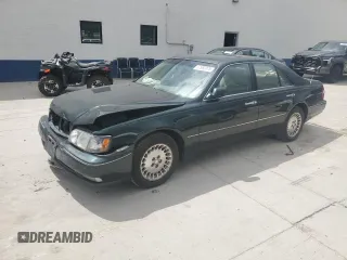 1999 Infiniti Q45 z VIN JNKBY31A6XM600579, wystawiony jako Copart lot #57683075 z przebiegiem 215 415 mil mil oraz Szkoda całkowita • Salvage title. Historia ofert i sprzedaży dostępna na DreamBid. Obrazek 1.
