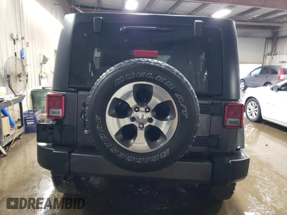 2017 Jeep Wrangler Unlimited Sahara with VIN 1C4BJWEG8HL593700, listed as a Copart auction lot 87053434 with 0 mi miles and Non Repairable. Bid and sale history available at carsss.com. Image 6.