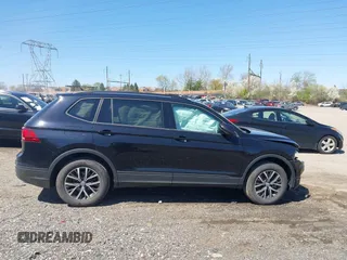 2021 Volkswagen Tiguan S with VIN 3VV0B7AXXMM040752, listed as a IAAI auction lot 41988353 with 51,757 mi miles and . Bid and sale history available at DreamBid. Image 13.