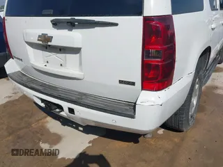 2010 Chevrolet Tahoe LS with VIN 1GNMCAE3XAR215407, listed as a IAAI auction lot 42185643 with 201,070 mi miles and . Bid and sale history available at DreamBid. Image 6.