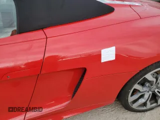 2014 Audi R8 z VIN WUAVNAFG9EN000206, wystawiony jako Copart lot #76712994 z przebiegiem Nie podano mil oraz Nie do naprawy • Non repairable. Historia ofert i sprzedaży dostępna na DreamBid. Obrazek 12.