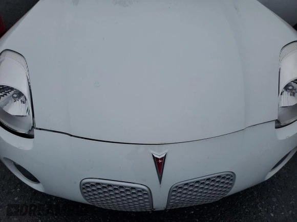 2006 Pontiac Solstice z VIN 1G2MB33B56Y106095, wystawiony jako Copart lot #52068765 z przebiegiem Nie podano mil oraz Szkoda całkowita • Salvage title. Historia ofert i sprzedaży dostępna na DreamBid. Obrazek 11.
