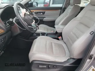 2018 Honda CR-V Touring with VIN 7FARW1H93JE055337, listed as a Copart auction lot 45045305 with 74,776 mi miles and Salvage Title. Bid and sale history available at DreamBid. Image 7.