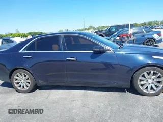 2016 Cadillac CTS RWD with VIN 1G6AP5SX8G0119984, listed as a IAAI auction lot 41679567 with 98,592 mi miles and . Bid and sale history available at DreamBid. Image 13.