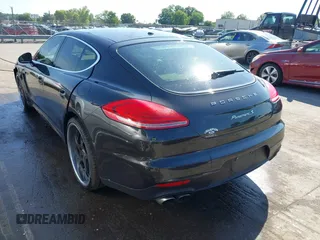 2014 Porsche Panamera S E-Hybrid with VIN WP0AD2A76EL044591, listed as a IAAI auction lot 42436817 with 89,009 mi miles and . Bid and sale history available at DreamBid. Image 3.
