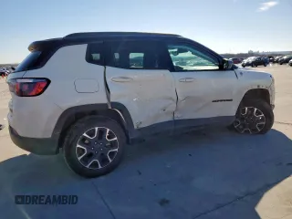 2020 Jeep Compass Trailhawk with VIN 3C4NJDDB7LT118561, listed as a Copart auction lot 46740025 with 61,286 mi miles and Salvage Title. Bid and sale history available at carsss.com. Image 3.