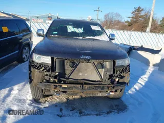 2014 Jeep Grand Cherokee Overland with VIN 1C4RJFCG1EC200570, listed as a IAAI auction lot 41301398 with 183,986 mi miles. Bid and sale history available at carsss.com. Image 13.