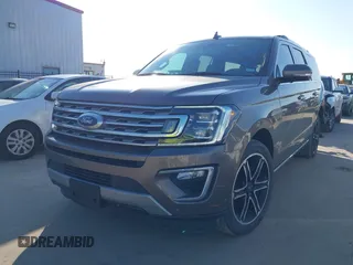 2019 Ford Expedition Max Limited with VIN 1FMJK1KTXKEA75351, listed as a IAAI auction lot 41620986 with 91,281 mi miles and . Bid and sale history available at DreamBid. Image 2.