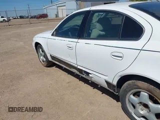 2004 Oldsmobile Alero GL1 z VIN 1G3NL52E24C192576, wystawiony jako IAAI lot #42279477 z przebiegiem 207 050 mil mil oraz . Historia ofert i sprzedaży dostępna na DreamBid. Obrazek 6.