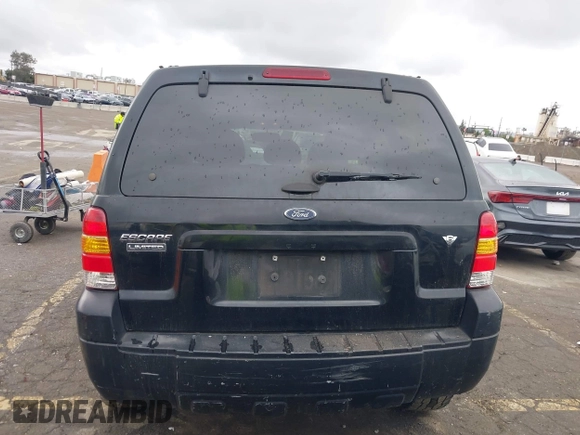 2005 Ford Escape Limited z VIN 1FMYU04155KC05430, wystawiony jako IAAI lot #41784958 z przebiegiem 190 822 mil mil oraz . Historia ofert i sprzedaży dostępna na DreamBid. Obrazek 16.