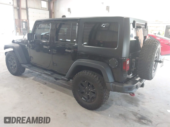 2017 Jeep Wrangler Unlimited Sport with VIN 1C4HJWDG2HL557576, listed as a IAAI auction lot 42712859 with 86,280 mi miles and . Bid and sale history available at DreamBid. Image 3.