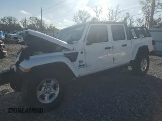 2021 Jeep Gladiator Freedom with VIN 1C6HJTAGXML557586, listed as a Copart auction lot 43510795 with Not provided miles and Salvage title. Bid and sale history available at DreamBid. Image 1.