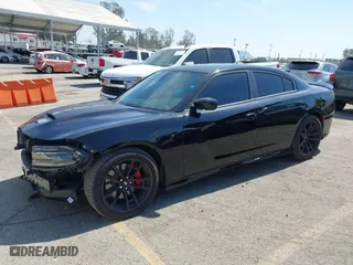 2023 Dodge Charger Scat Pack Widebody with VIN 2C3CDXGJ5PH697779, listed as a IAAI auction lot 41827418 with 9,963 mi miles. Bid and sale history available at carsss.com. Image 18.