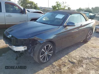 2020 BMW 2 Series 230i xDrive with VIN WBA2K1C08L7G28887, listed as a IAAI auction lot 42122785 with 30,599 mi miles and . Bid and sale history available at carsss.com. Image 17.