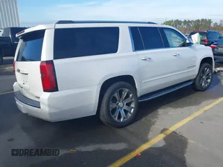 2019 Chevrolet Suburban LT with VIN 1GNSCJKC1KR146104, listed as a IAAI auction lot 41103371 with 108,727 mi miles. Bid and sale history available at carsss.com. Image 4.