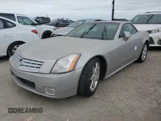 2008 Cadillac XLR z VIN 1G6YV36A285600199, wystawiony jako Copart lot #76229514 z przebiegiem Nie podano mil oraz Szkody całkowita. Historia ofert i sprzedaży dostępna na DreamBid. Obrazek 1.