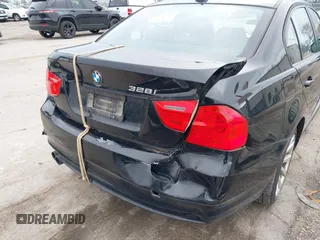 2011 BMW 3 Series 328i xDrive with VIN WBAPK7G5XBNN77494, listed as a IAAI auction lot 41894755 with 244,376 mi miles and . Bid and sale history available at carsss.com. Image 6.