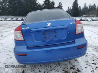 2012 Suzuki SX4 LE with VIN JS2YC5A30C6305375, listed as a Copart auction lot 45429185 with 103,283 mi miles and Salvage Title. Bid and sale history available at DreamBid. Image 6.