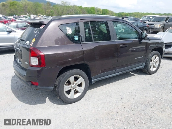 2014 Jeep Compass Latitude with VIN 1C4NJDEBXED622352, listed as a IAAI auction lot 42130403 with 149,024 mi miles. Bid and sale history available at carsss.com. Image 4.