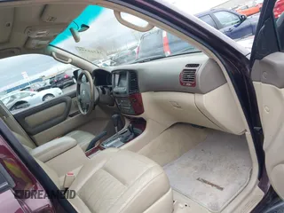 2004 Toyota Land Cruiser with VIN JTEHT05J242066695, listed as a IAAI auction lot 41725358 with 226,895 mi miles. Bid and sale history available at carsss.com. Image 5.
