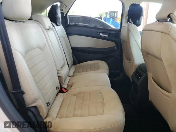 2015 Ford Edge SE with VIN 2FMTK3G9XFBB70947, listed as a Copart auction lot 58873715 with 142,233 mi miles and Salvage title. Bid and sale history available at DreamBid. Image 11.