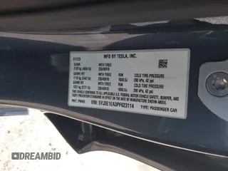 2023 Tesla Model 3 with VIN 5YJ3E1EA3PF623114, listed as a IAAI auction lot 41710385 with 31,663 mi miles and . Bid and sale history available at carsss.com. Image 9.