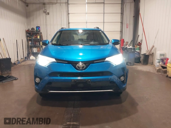 2016 Toyota RAV4 Limited with VIN JTMDFREV5GJ064094, listed as a IAAI auction lot 41862018 with 122,042 mi miles and . Bid and sale history available at DreamBid. Image 13.