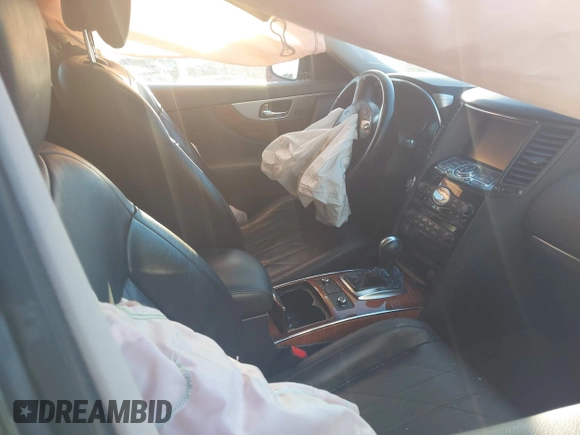 2015 Infiniti QX70 with VIN JN8CS1MWXFM480470, listed as a IAAI auction lot 41321666 with Not Provided miles and . Bid and sale history available at DreamBid. Image 5.