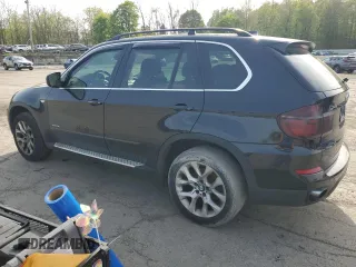 2013 BMW X5 xDrive35i z VIN 5UXZV4C56D0B24871, wystawiony jako Copart lot #55187185 z przebiegiem 141 533 mil mil oraz Czysty tytuł • Clean title. Historia ofert i sprzedaży dostępna na DreamBid. Obrazek 2.
