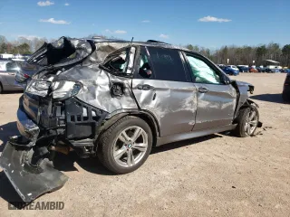 2015 BMW X5 xDrive50i with VIN 5UXKR6C52F0J73938, listed as a Copart auction lot 50601165 with 0 mi miles and Salvage Title. Bid and sale history available at carsss.com. Image 3.