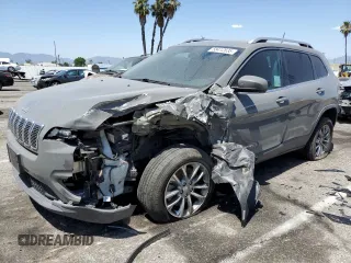 2020 Jeep Cherokee Altitude with VIN 1C4PJLLB4LD615593, listed as a Copart auction lot 58412635 with 95,697 mi miles and Salvage title. Bid and sale history available at DreamBid. Image 1.