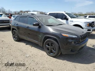 2015 Jeep Cherokee North with VIN 1C4PJMCS7FW750727, listed as a Copart auction lot 54077855 with 242,449 mi miles and Clean Title. Bid and sale history available at carsss.com. Image 4.