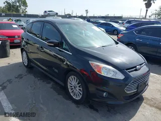 2015 Ford C-Max Energi SEL with VIN 1FADP5CU5FL109236, listed as a IAAI auction lot 41614251 with 143,942 mi miles. Bid and sale history available at carsss.com. Image 1.