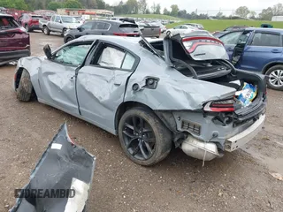 2022 Dodge Charger SXT with VIN 2C3CDXBGXNH145896, listed as a IAAI auction lot 42010378 with 24,561 mi miles and . Bid and sale history available at DreamBid. Image 3.